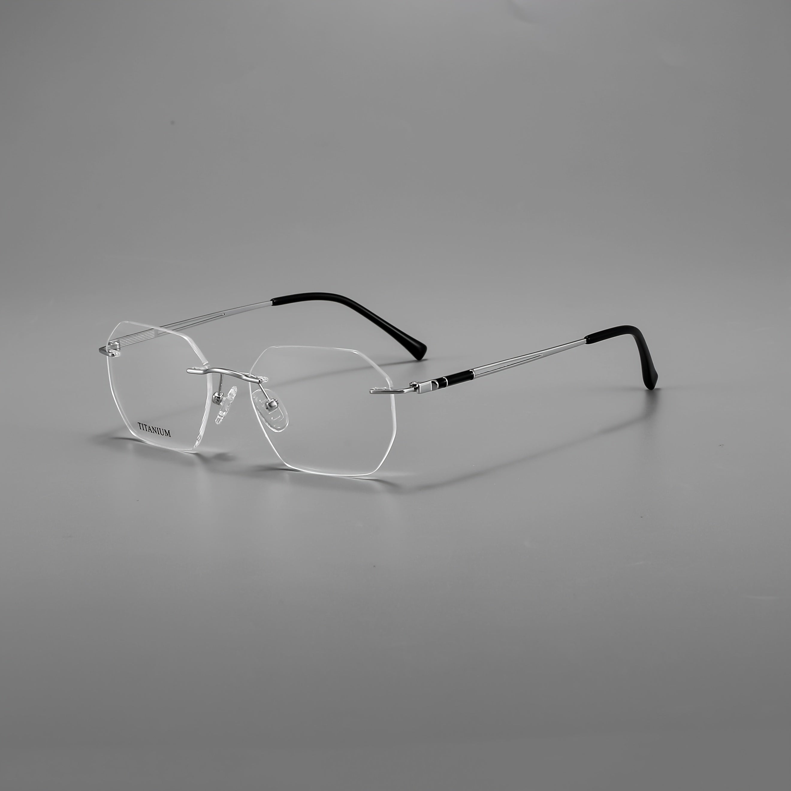Model YJ0059 Features Frameless Glasses Made of Pure Titanium, Suitable for Both Men And Women. These Elegant, High-End Eyewear Pieces Are Designed for a Business Style And Cater to Those with Larger Faces. This Is The New Edition for 2026