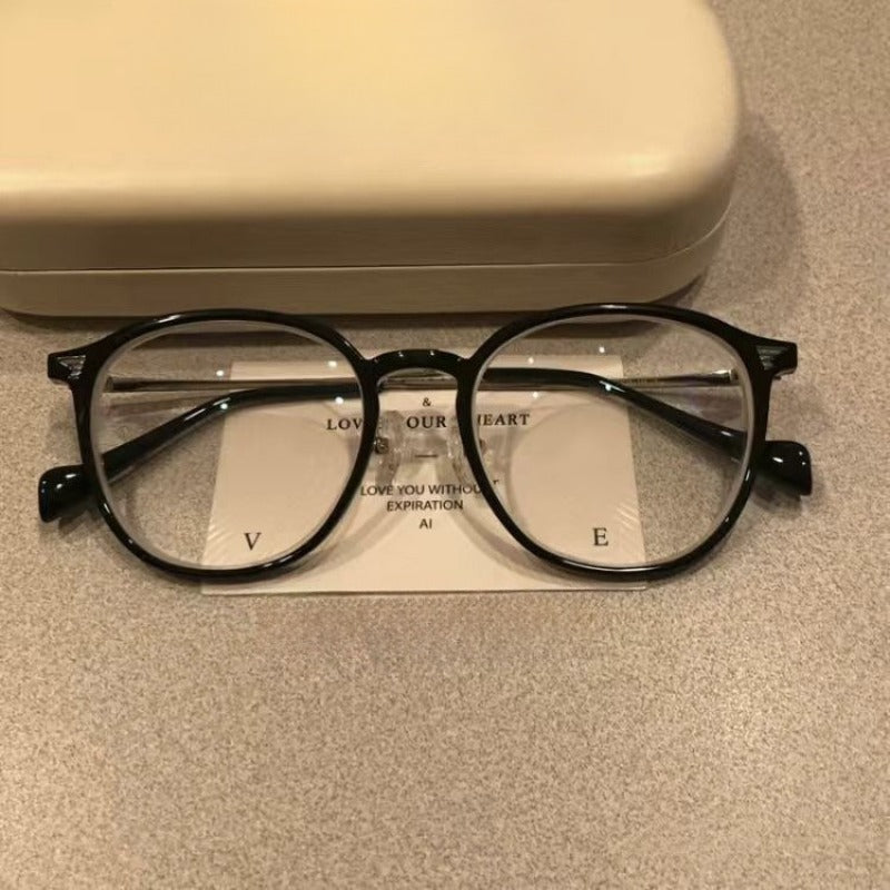 A Pair of Cold Brown Glasses with a Frame Suitable for Both Square And Round Faces, Designed for Smaller Faces, Featuring Anti-Blue Light Lenses, But Without a Case