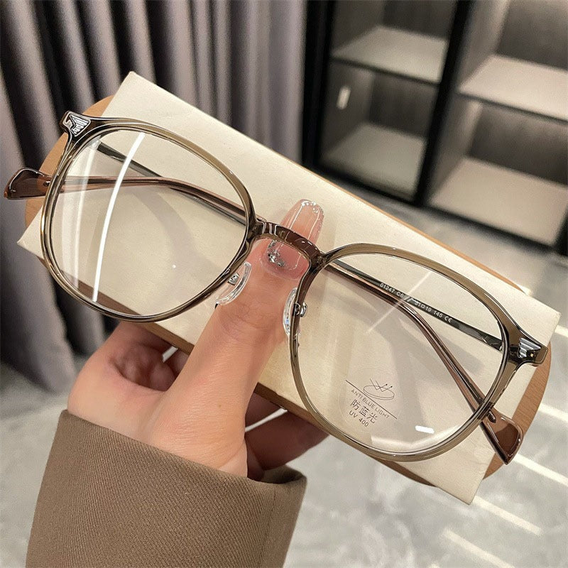 A Pair of Cold Brown Glasses with a Frame Suitable for Both Square And Round Faces, Designed for Smaller Faces, Featuring Anti-Blue Light Lenses, But Without a Case