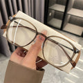 A Pair of Cold Brown Glasses with a Frame Suitable for Both Square And Round Faces, Designed for Smaller Faces, Featuring Anti-Blue Light Lenses, But Without a Case